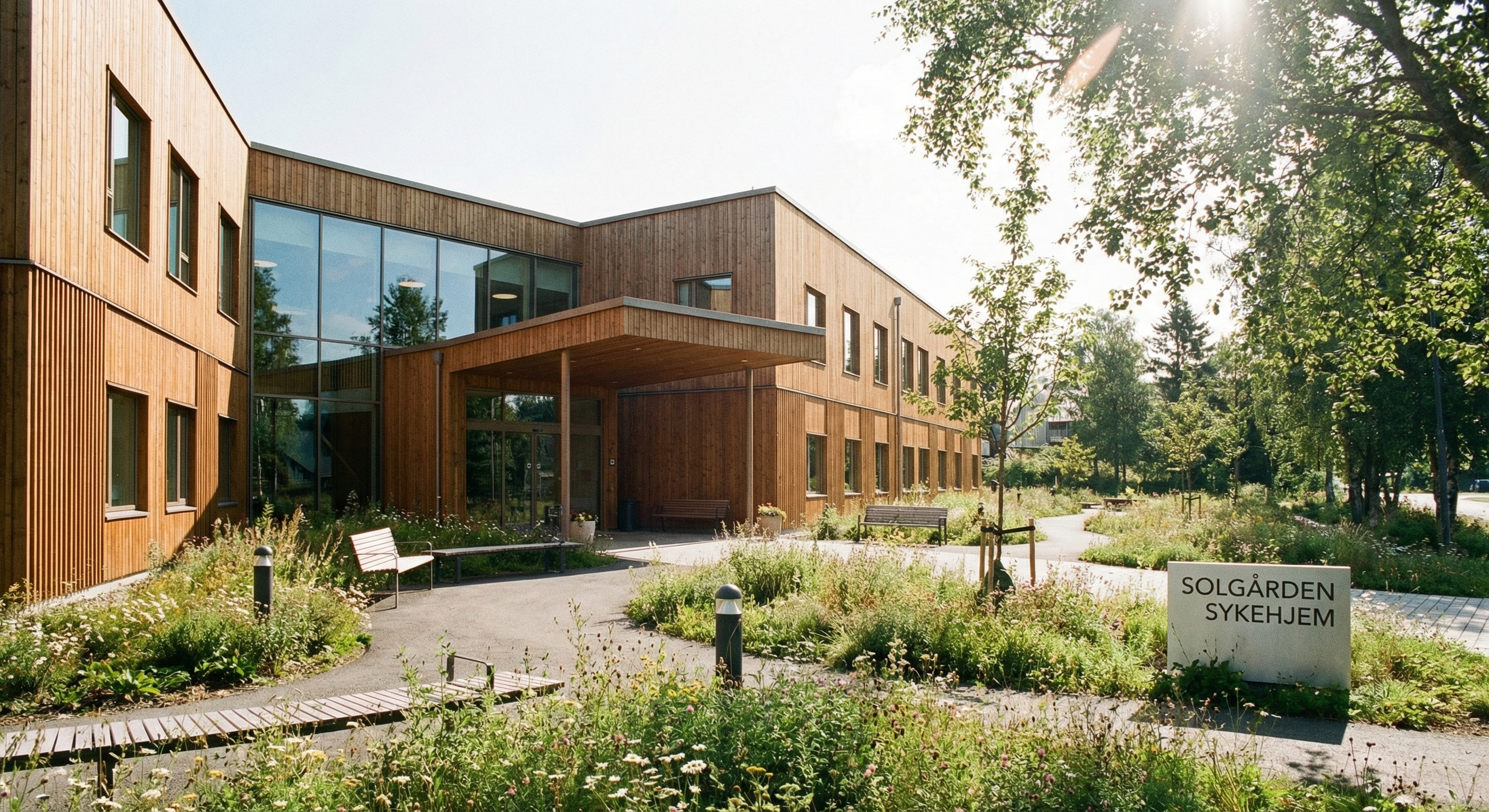 Omsorgsperson og eldre person i sykehjemsmiljø